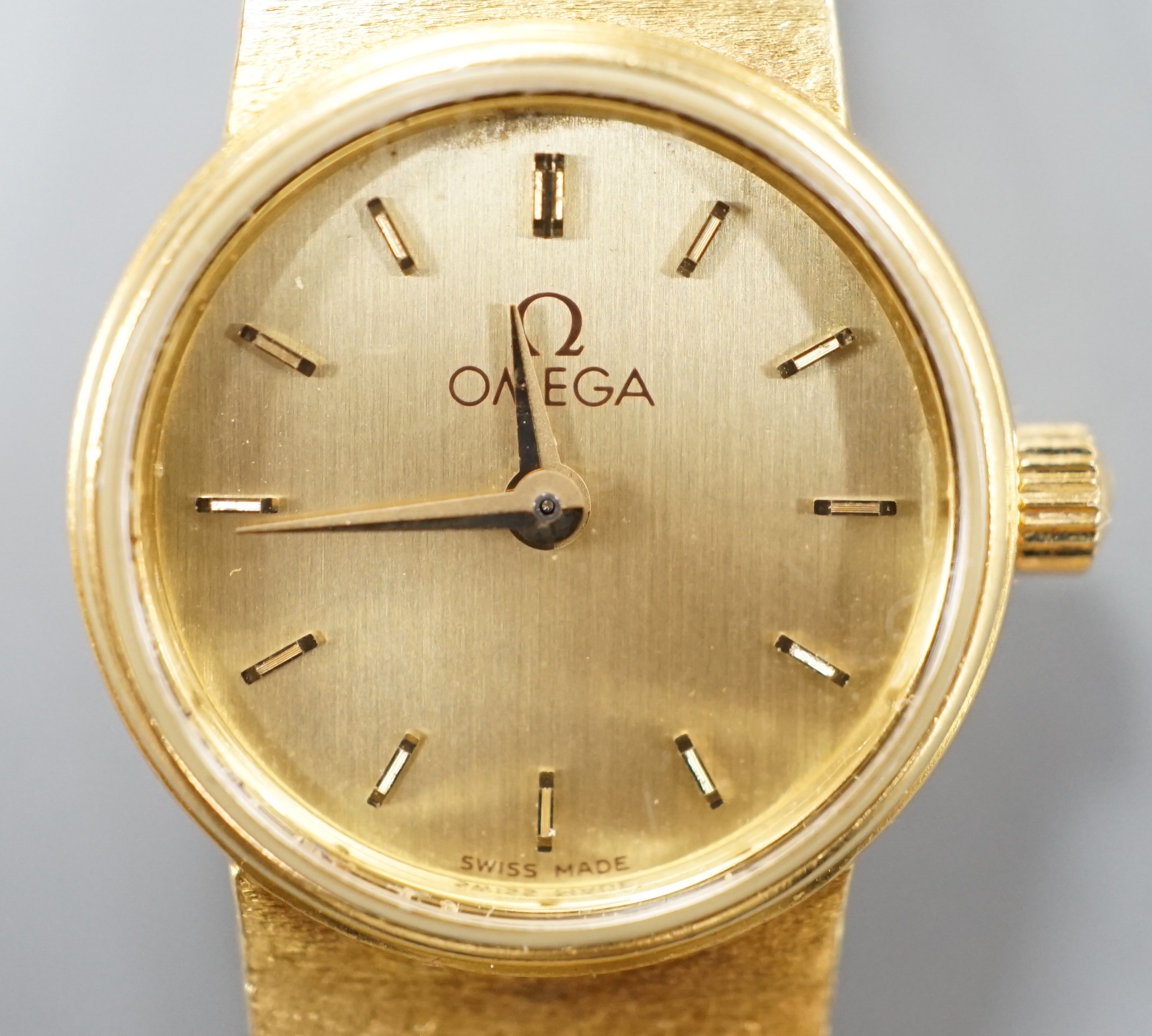 A lady's 18ct gold Omega quartz wrist watch